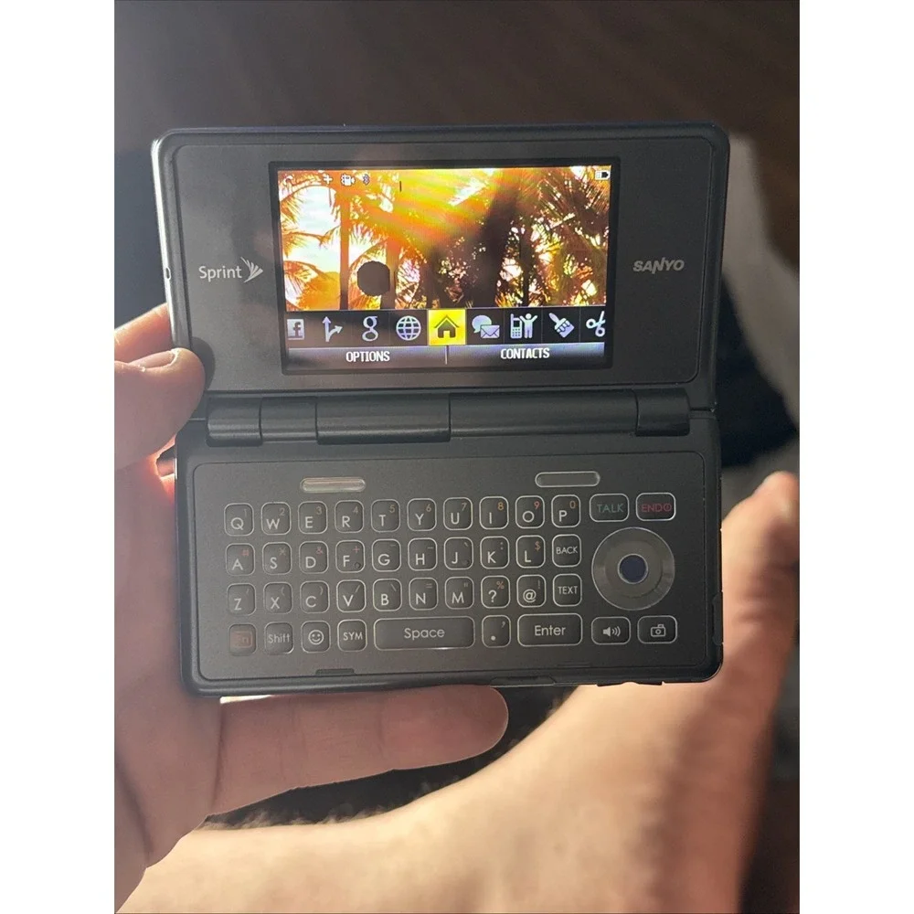 Sanyo Innuendo SCP-6780 Sprint Blue Kyocera Has Ink Spot Works Has Power Manual